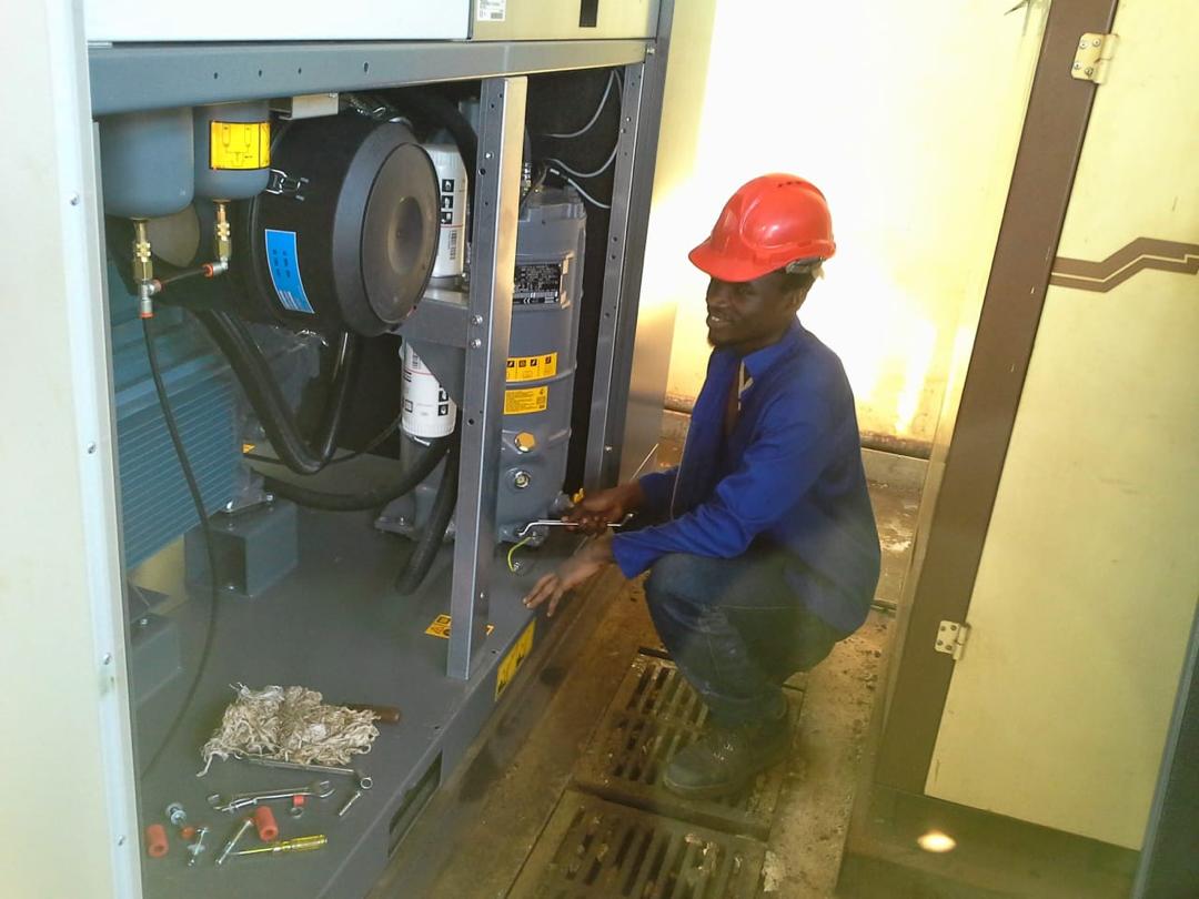 Varisco engineer working on industrial equipment